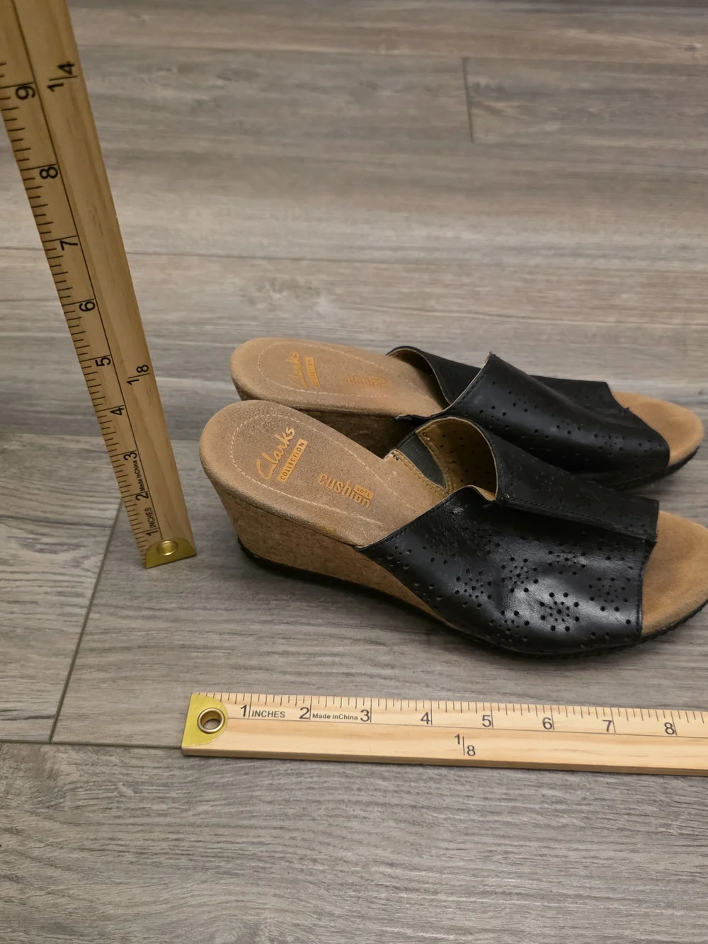Clarks Women's Black Perforated Slip-On Sandals